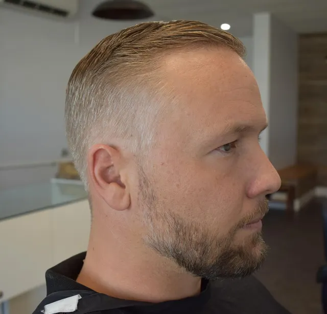 Close side fade and neat beard at Golden Four