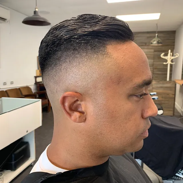 Dark cropped top with a high fade at Golden Four