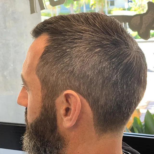Clean taper and full beard detail at Golden Four