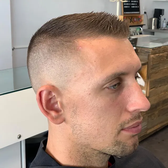 Blended skin fade and short top at Golden Four